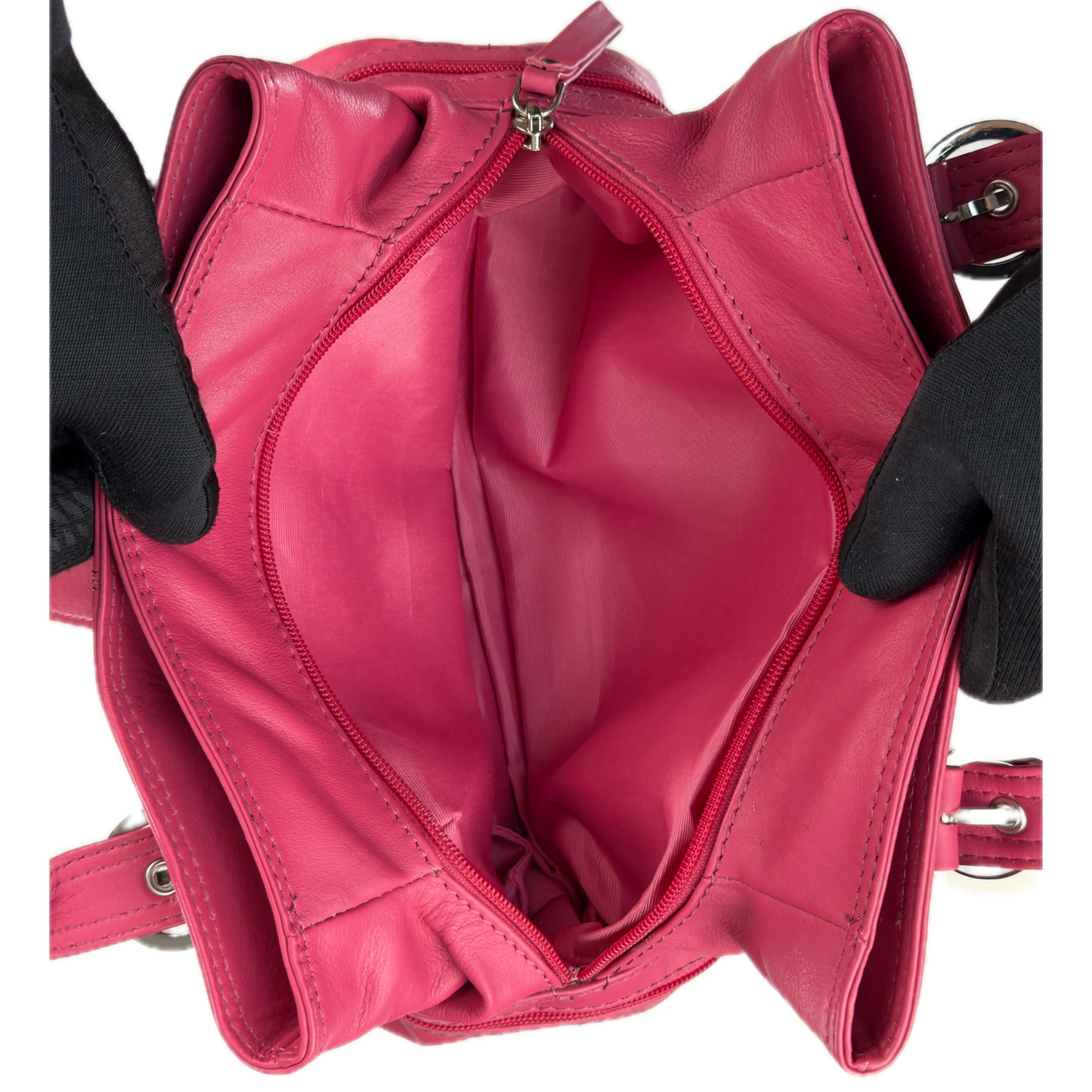 Vintage Clarks hot pink leather top handle bag featuring chunky silver buckle hardware and a triple compartment interior.