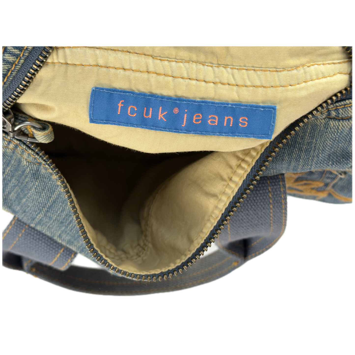 Vintage early 2000s FCUK denim top handle bag featuring a mustard yellow embroidered logo and two front jean pockets.