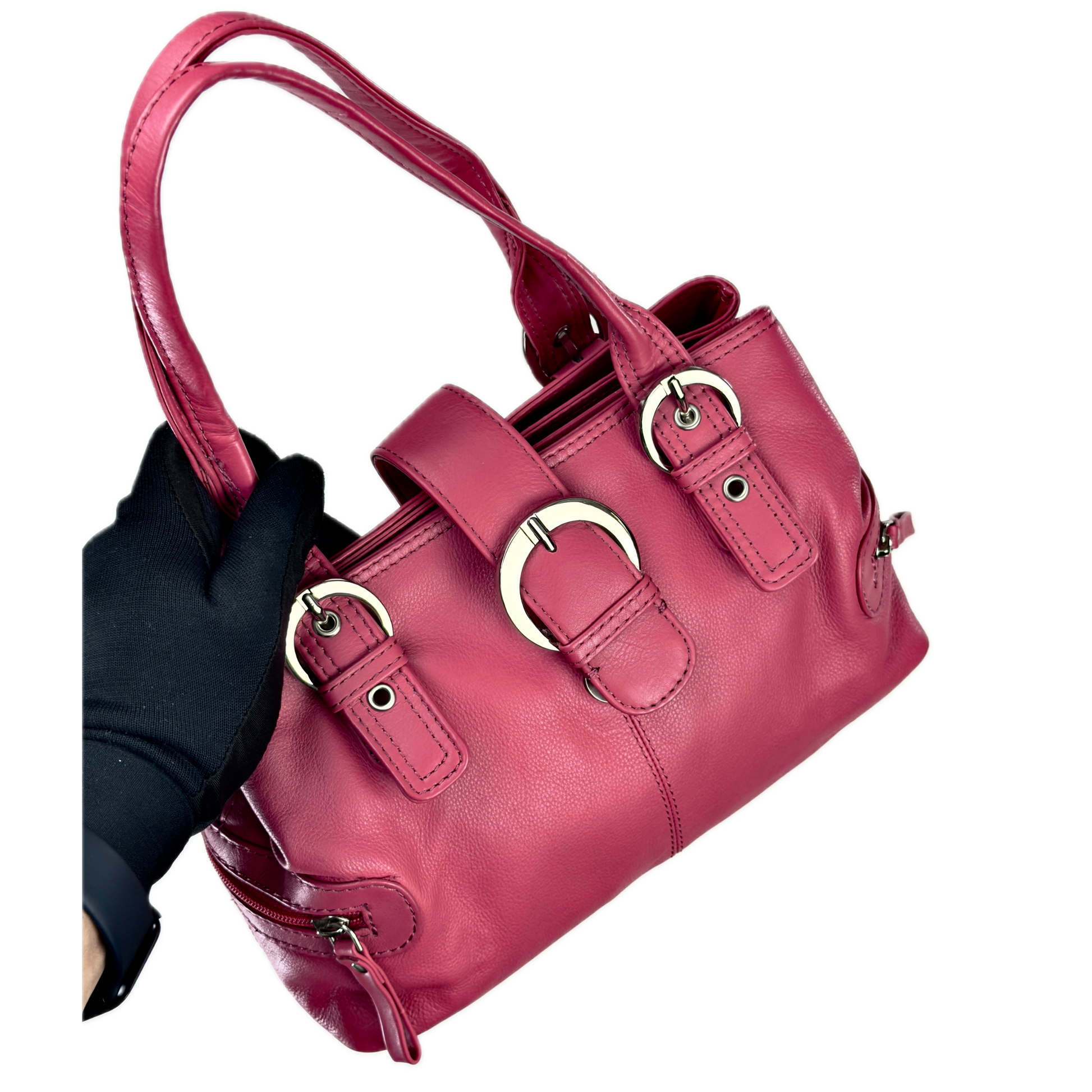 Vintage Clarks hot pink leather top handle bag featuring chunky silver buckle hardware and a triple compartment interior.