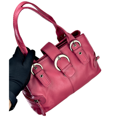 Vintage Clarks hot pink leather top handle bag featuring chunky silver buckle hardware and a triple compartment interior.