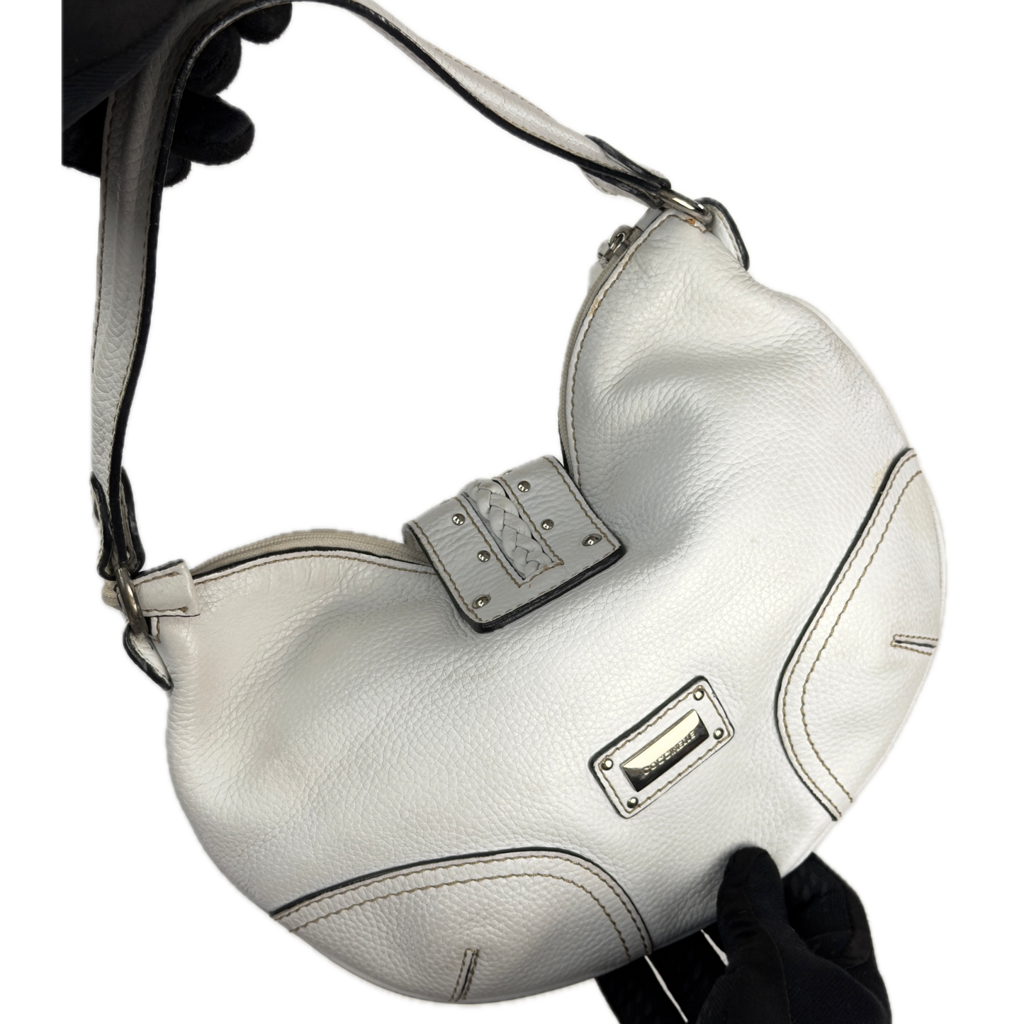 Vintage Coccinelle white pebbled leather hobo bag featuring braided leather details and silver stud hardware.