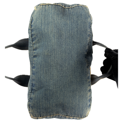 Vintage early 2000s FCUK denim top handle bag featuring a mustard yellow embroidered logo and two front jean pockets.