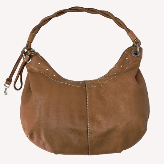 Vintage Fossil tan brown leather hobo bag featuring a braided shoulder strap, silver studs, and a signature key charm.