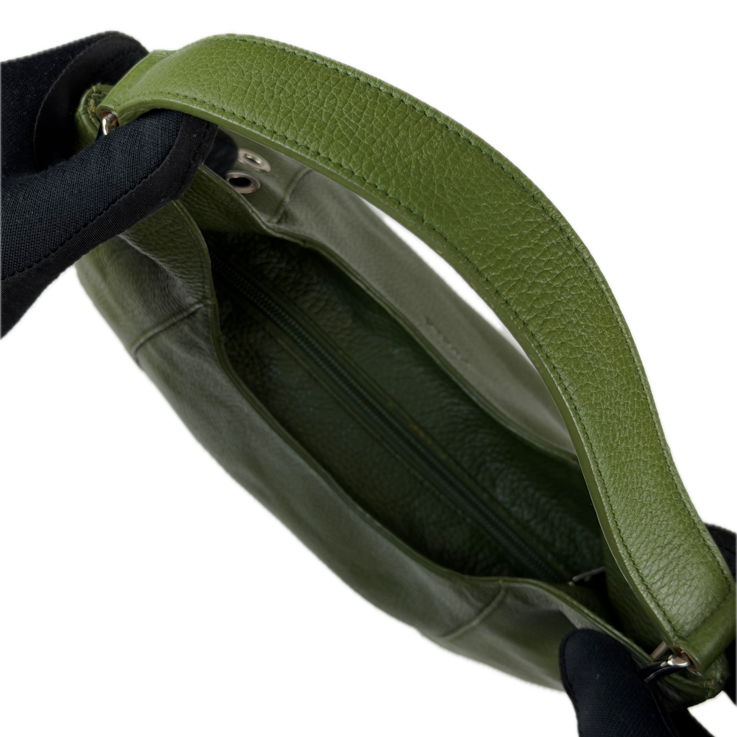 Vintage Furla forest green pebbled leather hobo bag featuring silver eyelet hardware and a structural shoulder strap.