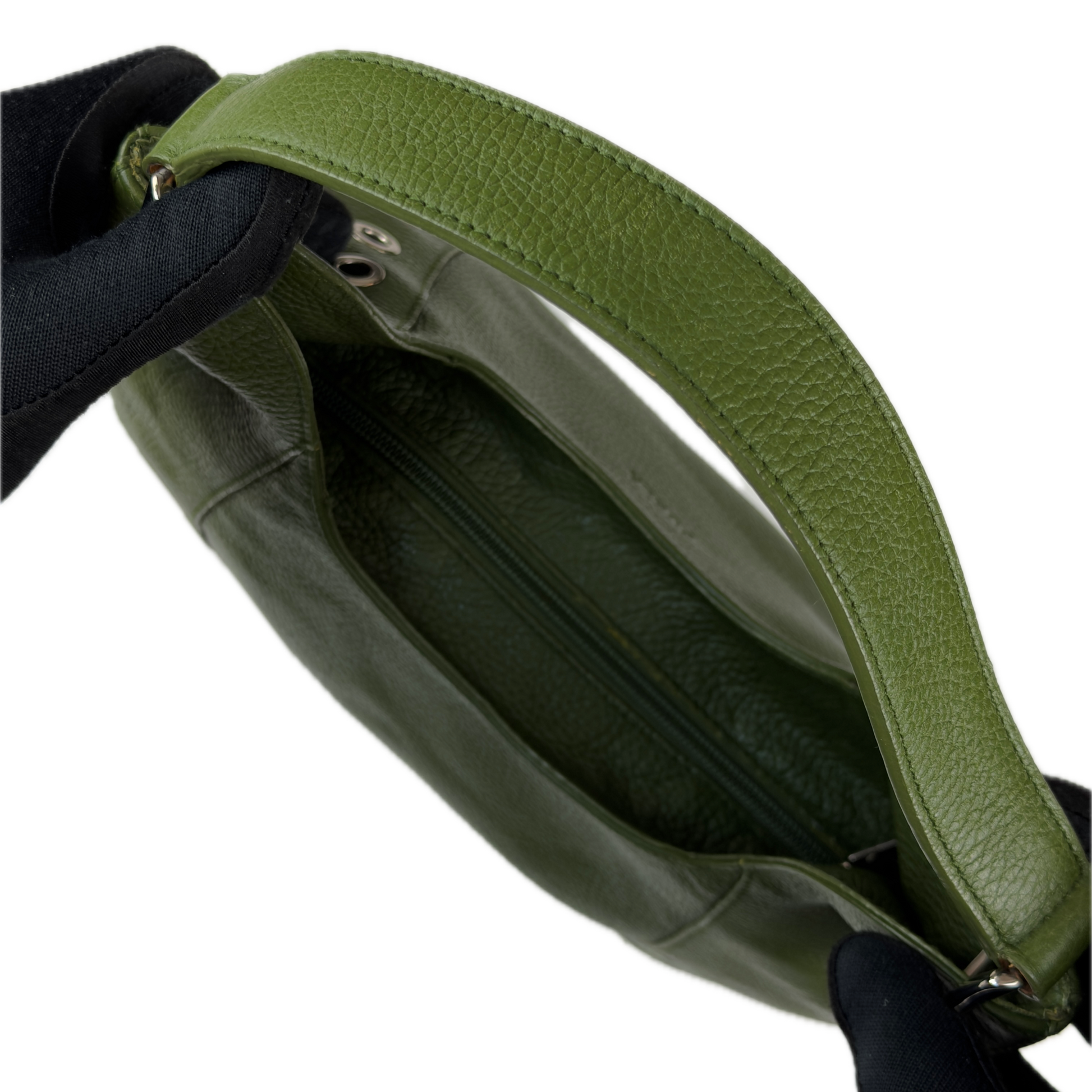 Vintage Furla forest green pebbled leather hobo bag featuring silver eyelet hardware and a structural shoulder strap.