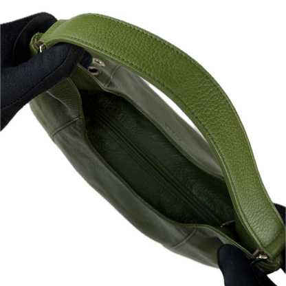 Vintage Furla forest green pebbled leather hobo bag featuring silver eyelet hardware and a structural shoulder strap.