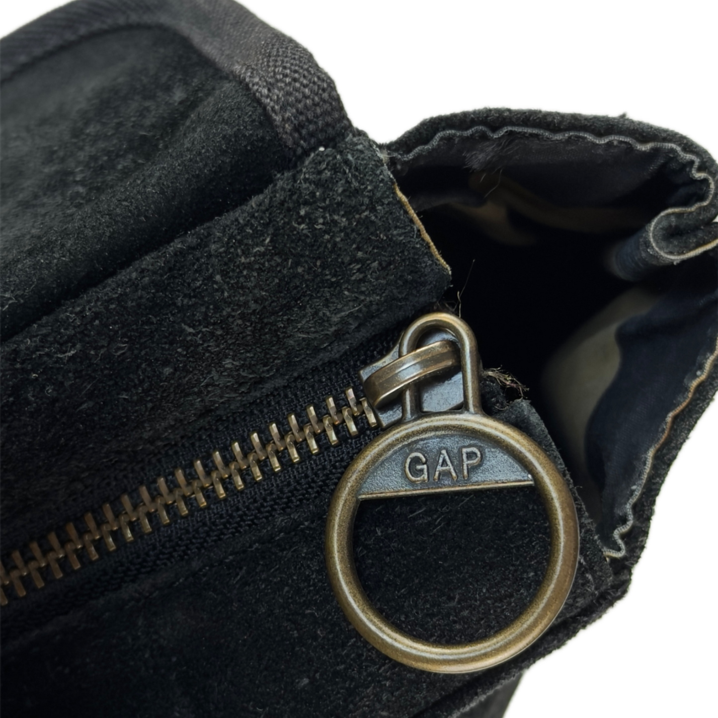 Vintage Gap black genuine suede shoulder bag featuring brass hardware and an oversized front button pocket.
