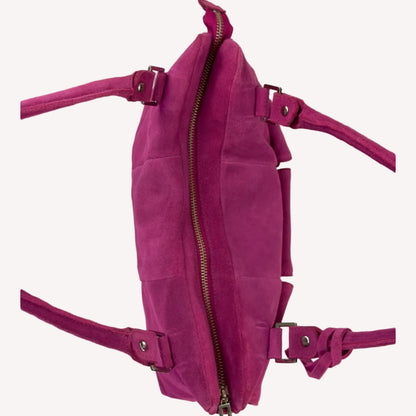 Vintage Y2K Jasper Conran shoulder bag in vibrant magenta pink suede, featuring three front pockets with silver twist-lock hardware and double straps.