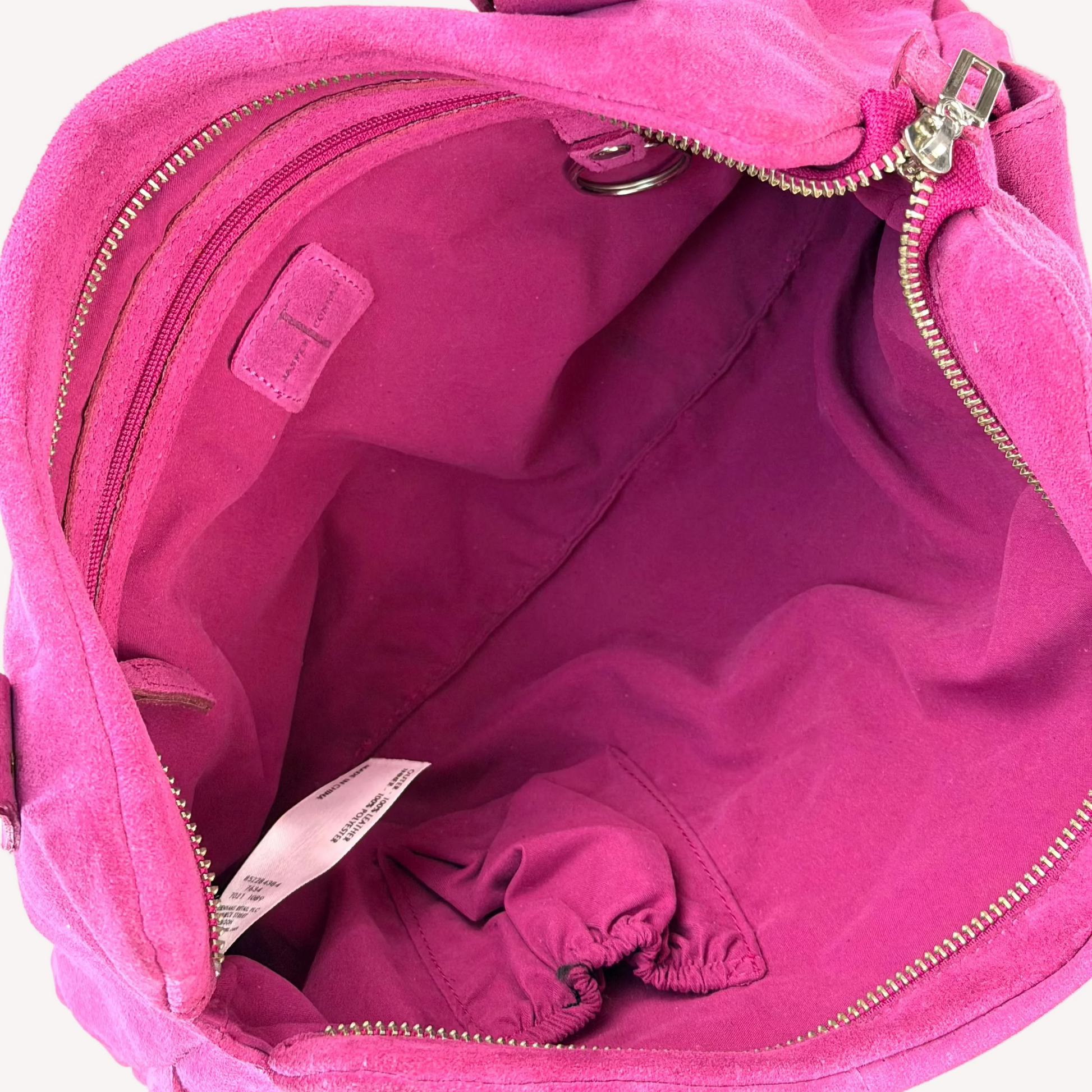 Vintage Y2K Jasper Conran shoulder bag in vibrant magenta pink suede, featuring three front pockets with silver twist-lock hardware and double straps.