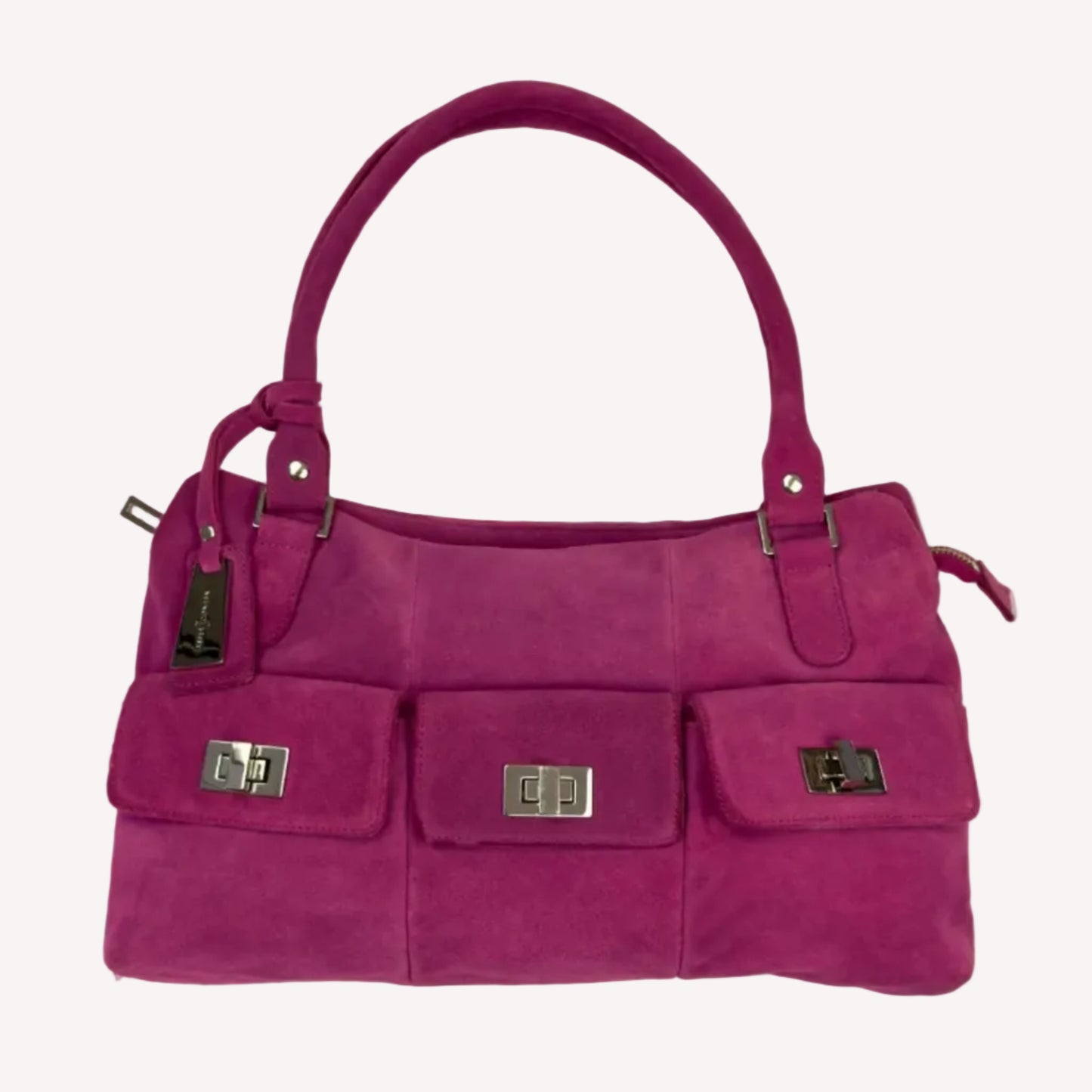 Vintage Y2K Jasper Conran shoulder bag in vibrant magenta pink suede, featuring three front pockets with silver twist-lock hardware and double straps.
