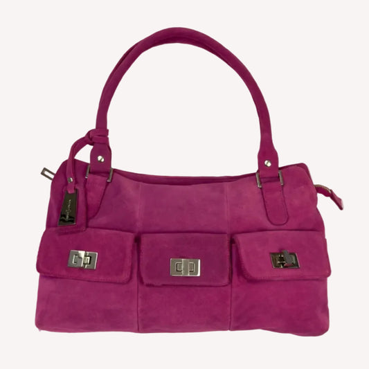Vintage Y2K Jasper Conran shoulder bag in vibrant magenta pink suede, featuring three front pockets with silver twist-lock hardware and double straps.