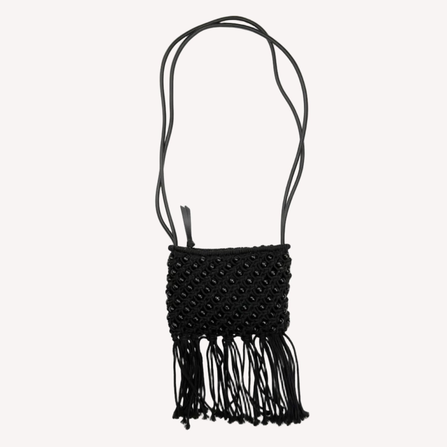 A vintage Jigsaw black long strap shoulder bag featuring beaded tassel detailing.