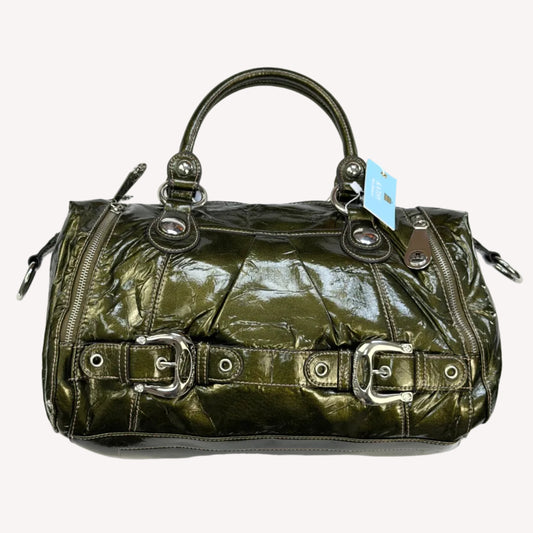 Deadstock vintage Y2K Kathy Van Zeeland metallic olive green crinkled faux patent leather bowler bag, featuring heavy silver buckle hardware, dual front pockets, and original tags.