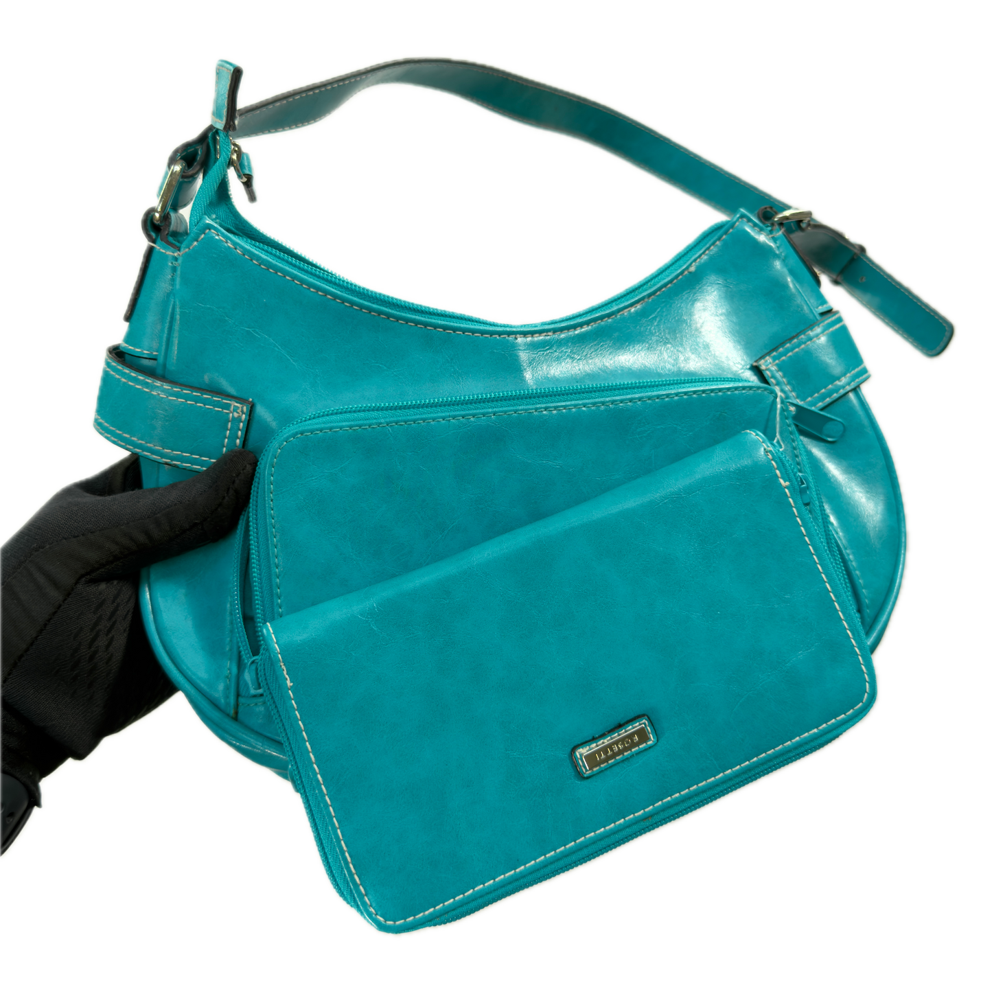 A vintage Y2K Rosetti blue crescent shoulder bag featuring a front buckle detail.
