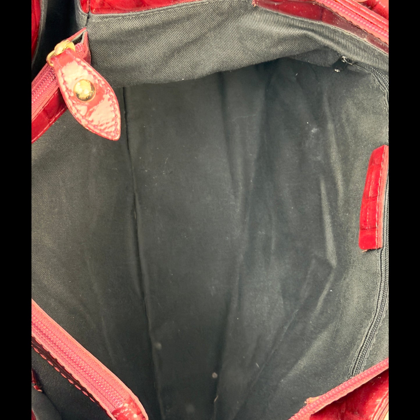 Vintage Russell & Bromley glossy red croc-embossed patent leather tote bag featuring gold chain and padlock hardware.