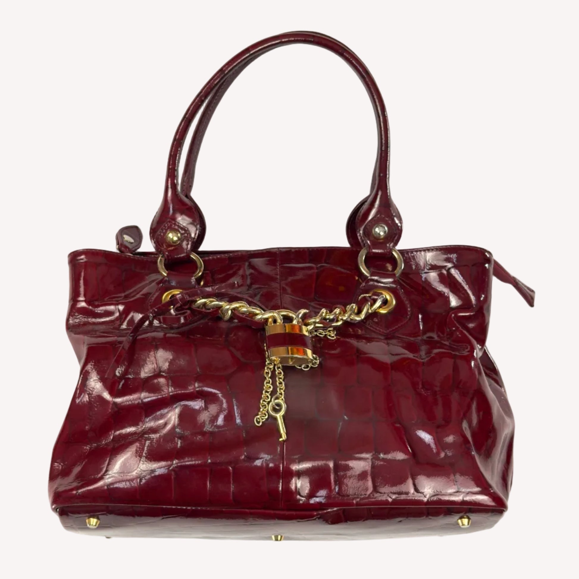 Vintage Russell & Bromley glossy red croc-embossed patent leather tote bag featuring gold chain and padlock hardware.