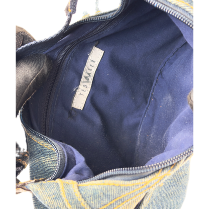 Vintage Ted Baker blue denim hobo shoulder bag featuring contrast yellow stitching, front jean pockets, and a canvas strap.