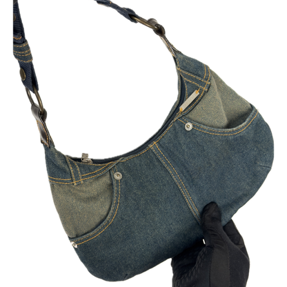 Vintage Ted Baker blue denim hobo shoulder bag featuring contrast yellow stitching, front jean pockets, and a canvas strap.
