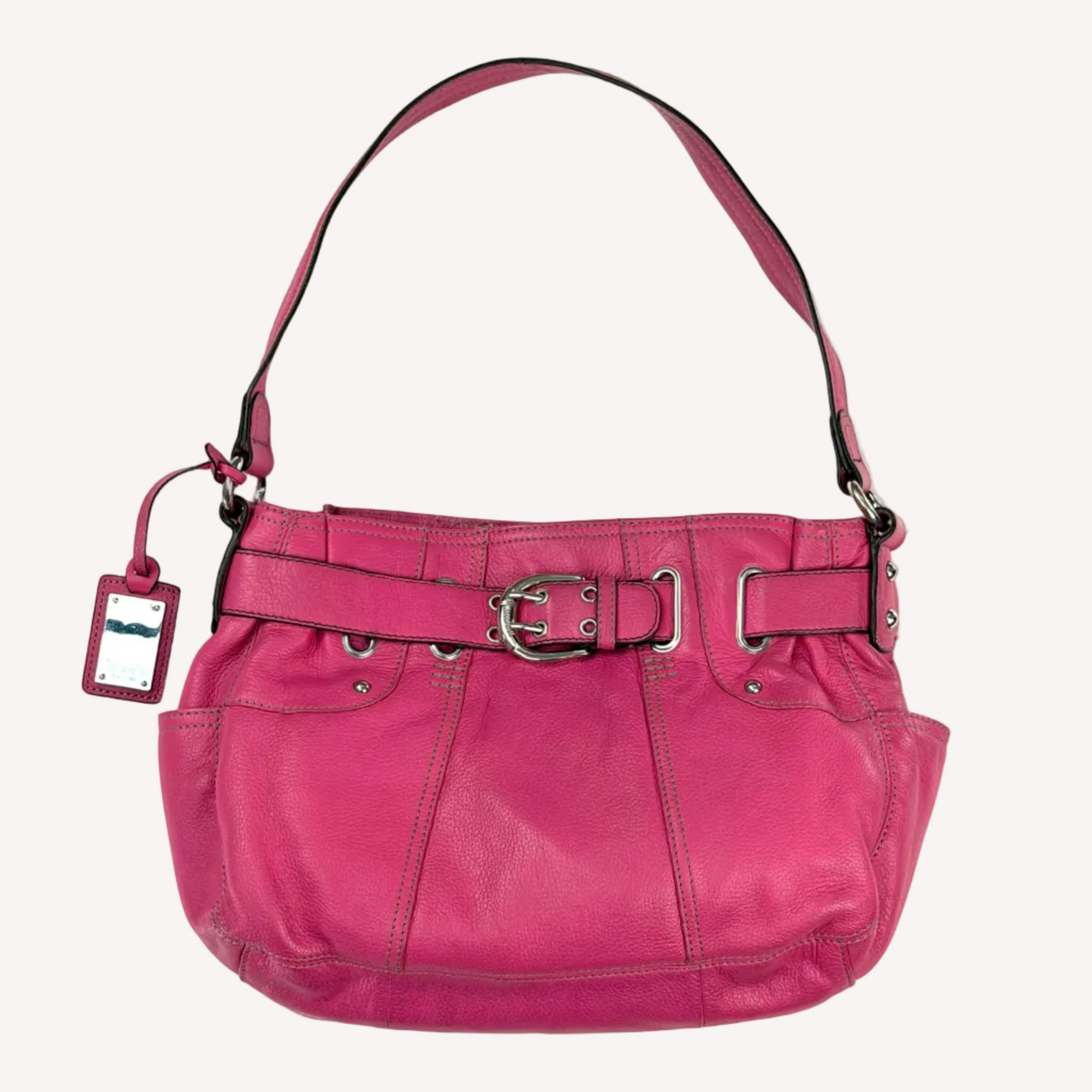 Vintage Y2K Tignanello hot pink pebbled leather shoulder bag featuring a statement silver front buckle, side slip pockets, and a branded metal hanging tag.