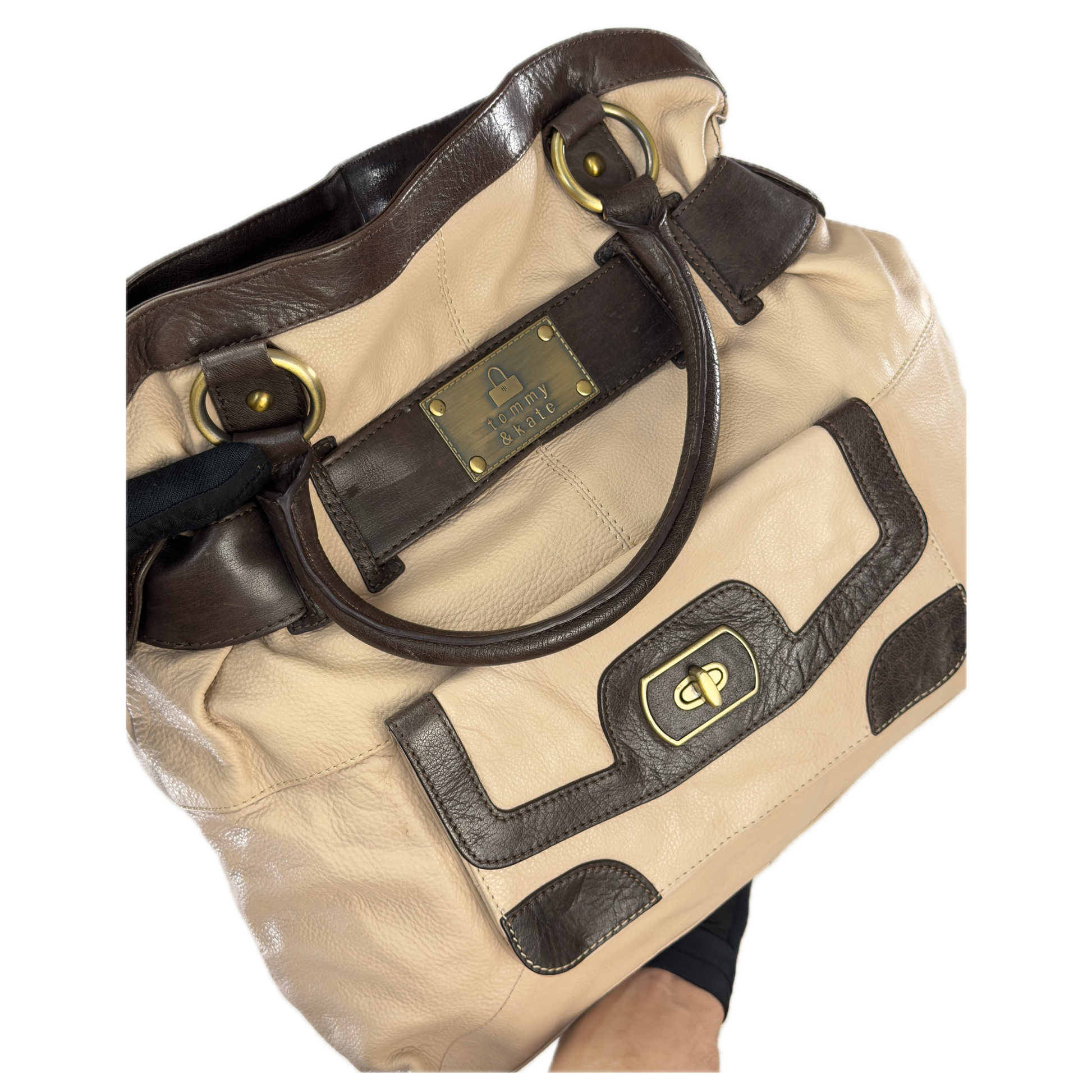 Vintage Tommy & Kate oversized slouchy tote bag in cream and chocolate brown leather, featuring brass hardware and a front pocket.