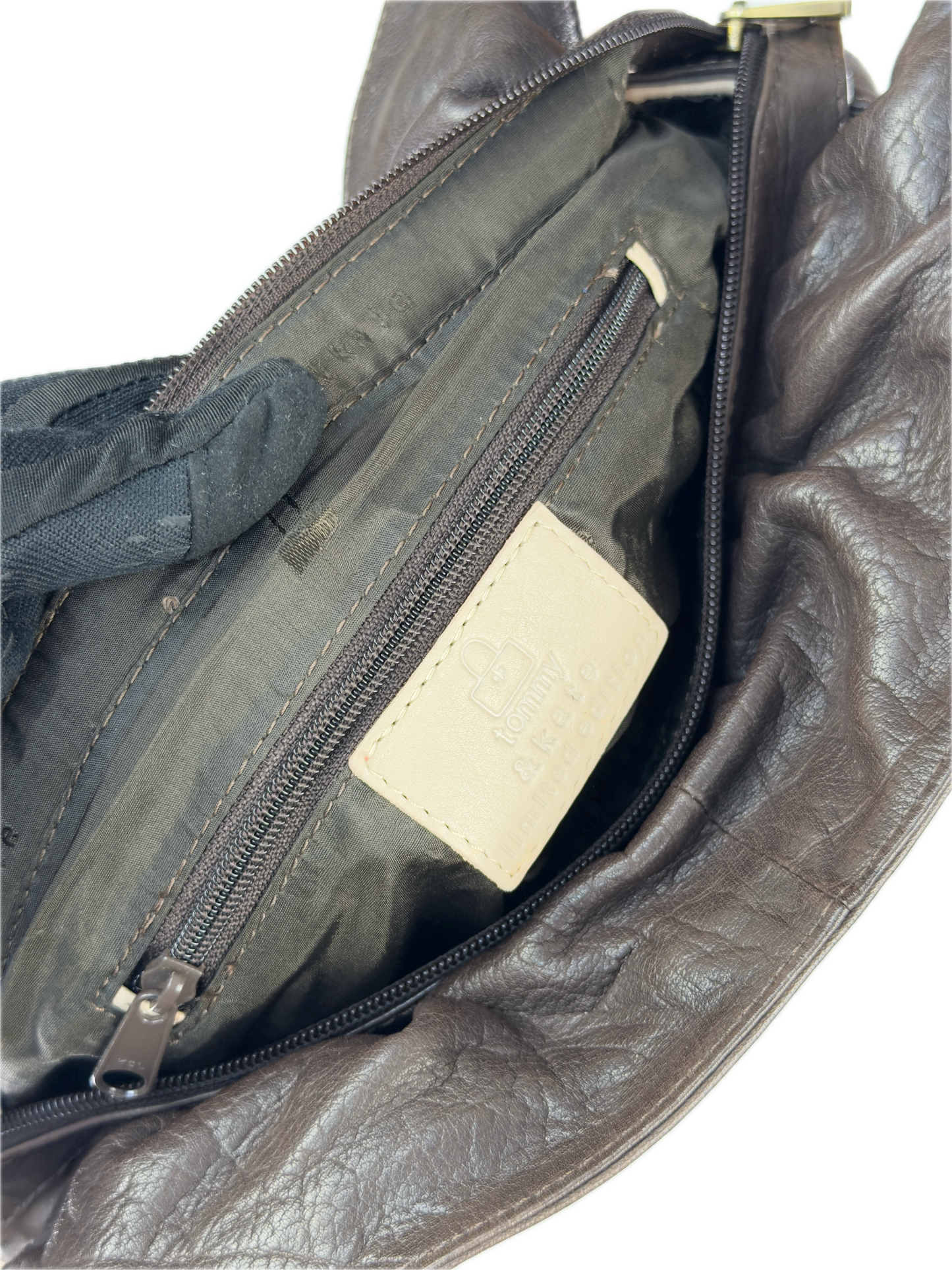 Vintage Tommy & Kate oversized slouchy tote bag in cream and chocolate brown leather, featuring brass hardware and a front pocket.