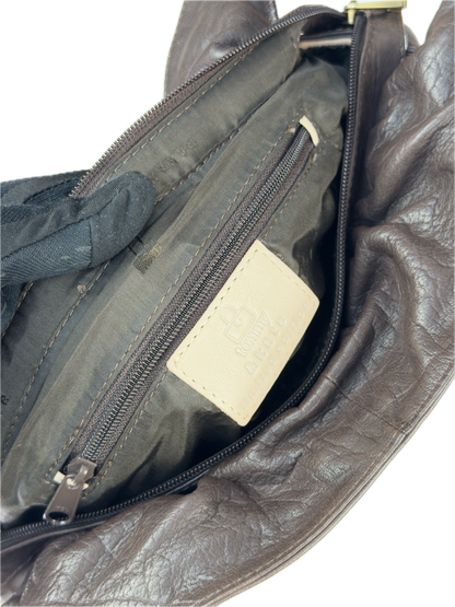 Vintage Tommy & Kate oversized slouchy tote bag in cream and chocolate brown leather, featuring brass hardware and a front pocket.