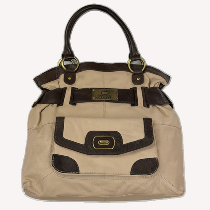 Vintage Tommy & Kate oversized slouchy tote bag in cream and chocolate brown leather, featuring brass hardware and a front pocket.