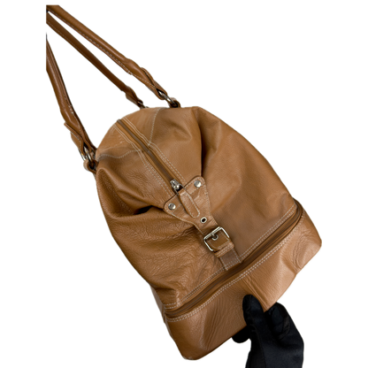 Vintage Tommy & Kate tan brown leather weekender travel bag featuring white contrast stitching, a lower shoe compartment, and a luggage tag.