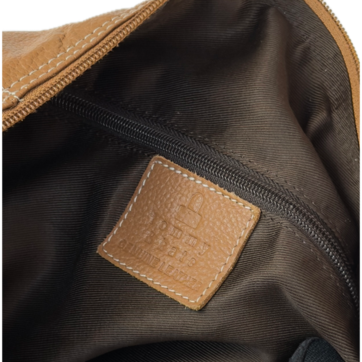 Vintage Tommy & Kate tan brown leather weekender travel bag featuring white contrast stitching, a lower shoe compartment, and a luggage tag.