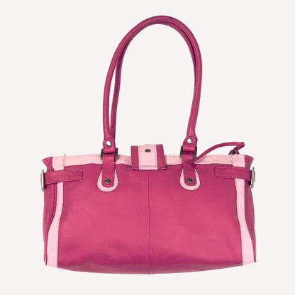 Vintage Y2K two-tone leather shoulder bag featuring a hot pink body, pale baby pink accents, and a silver front buckle.