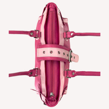 Vintage Y2K two-tone leather shoulder bag featuring a hot pink body, pale baby pink accents, and a silver front buckle.