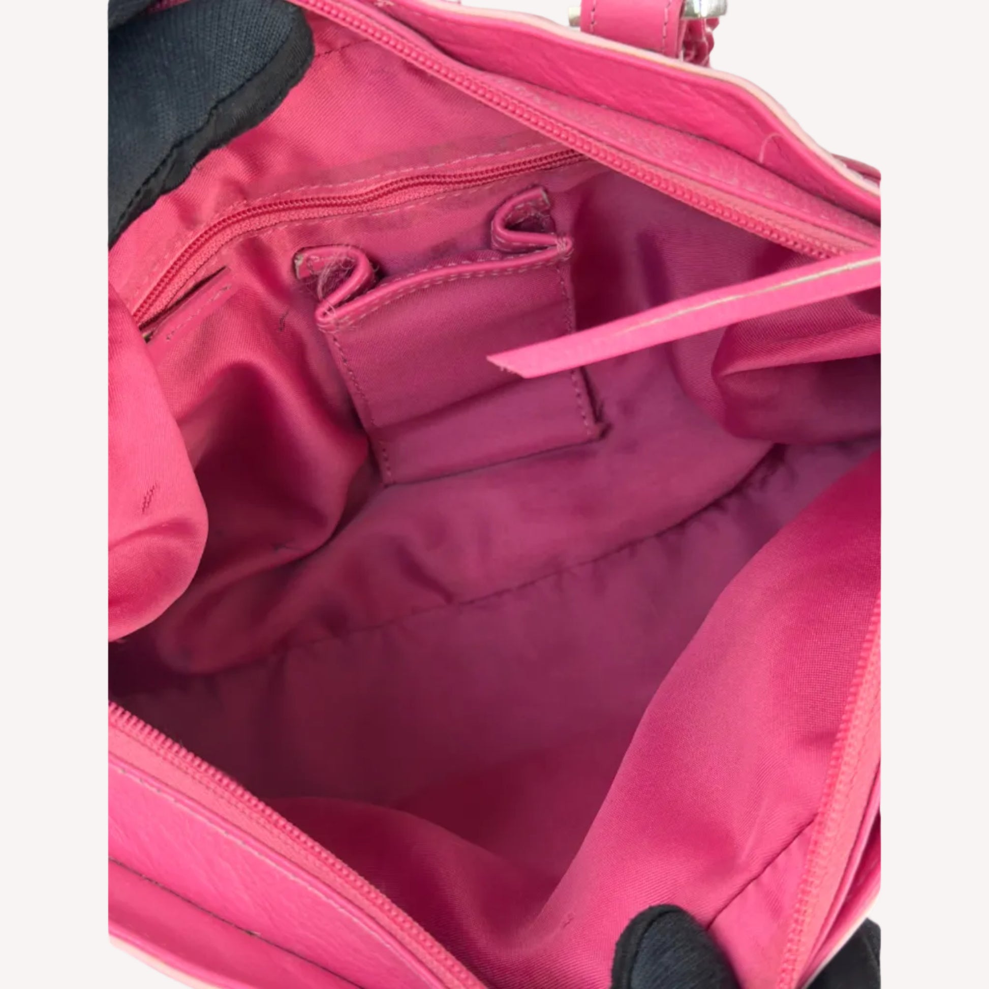 Vintage Y2K two-tone leather shoulder bag featuring a hot pink body, pale baby pink accents, and a silver front buckle.