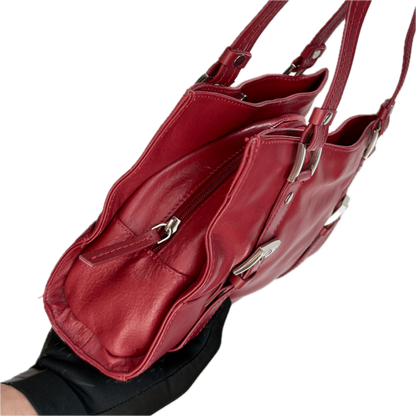 Side view of a structured vintage Y2K Collection by Debenhams glossy red shoulder bag featuring silver-tone buckle details. 