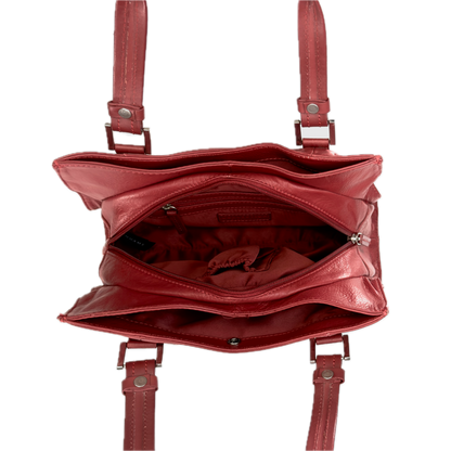 Top-down interior view of a vintage red shoulder bag showing three highly organised compartments and a clean red textile lining.