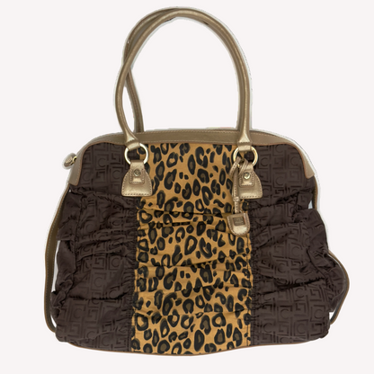 Front view of a vintage Y2K Liz Claiborne brown zebra animal print tote bag featuring tonal brown faux leather handles against a black background.