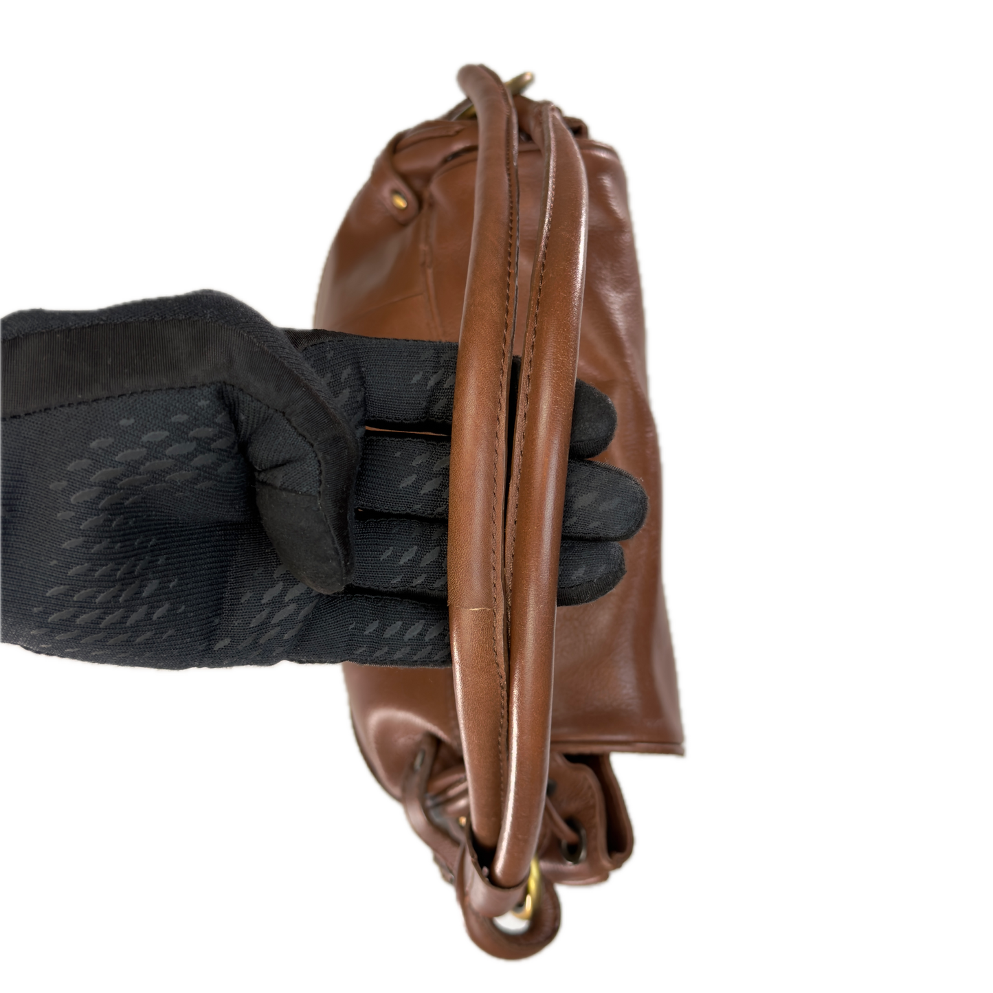 Handles of a structured vintage Y2K Modalù tan pebbled leather shoulder bag with an adjustable strap and gold hardware. 