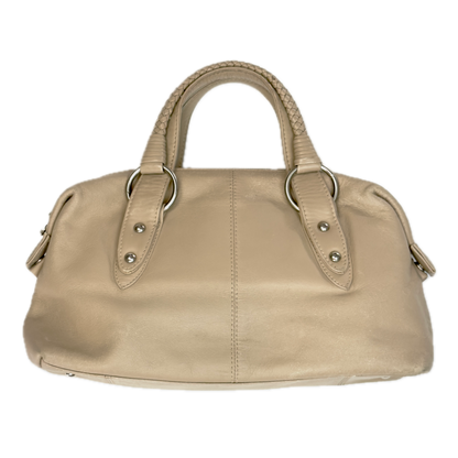 Rear view of a structured vintage Y2K Tula cool beige genuine leather top handle bag with silver hardware.