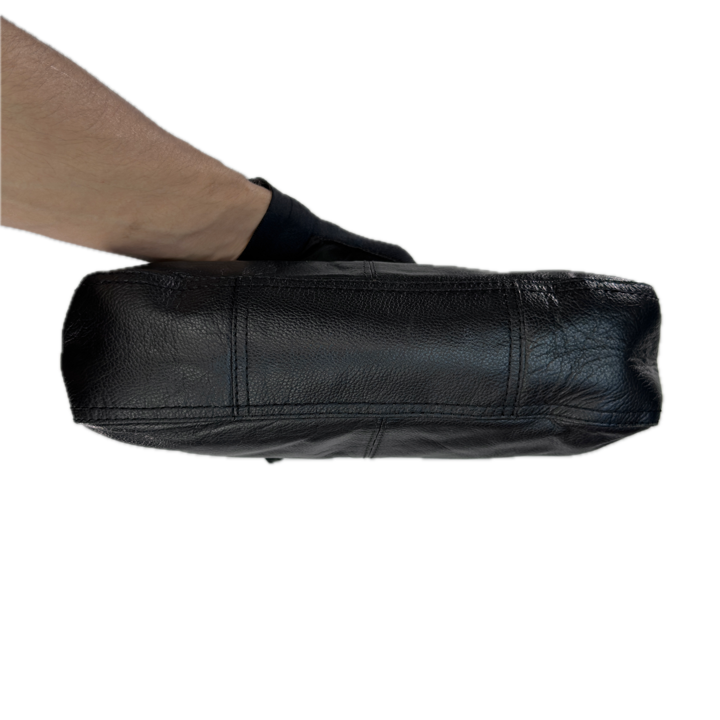 Underside view of a slouchy vintage Y2K unbranded black genuine leather baguette shoulder bag featuring a front zip pocket and silver hardware.