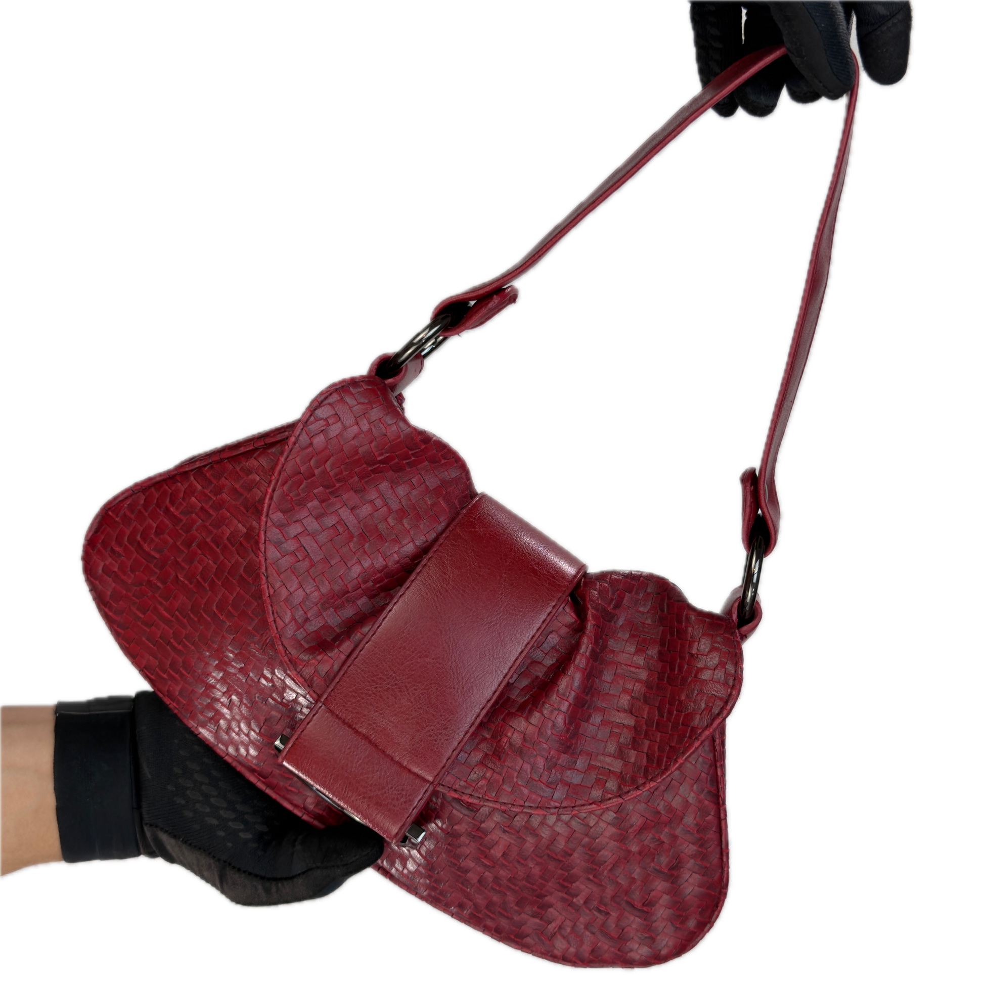 Front view of a vintage Y2K Wallis red woven faux leather baguette shoulder bag featuring gunmetal hardware and a smooth center flap.