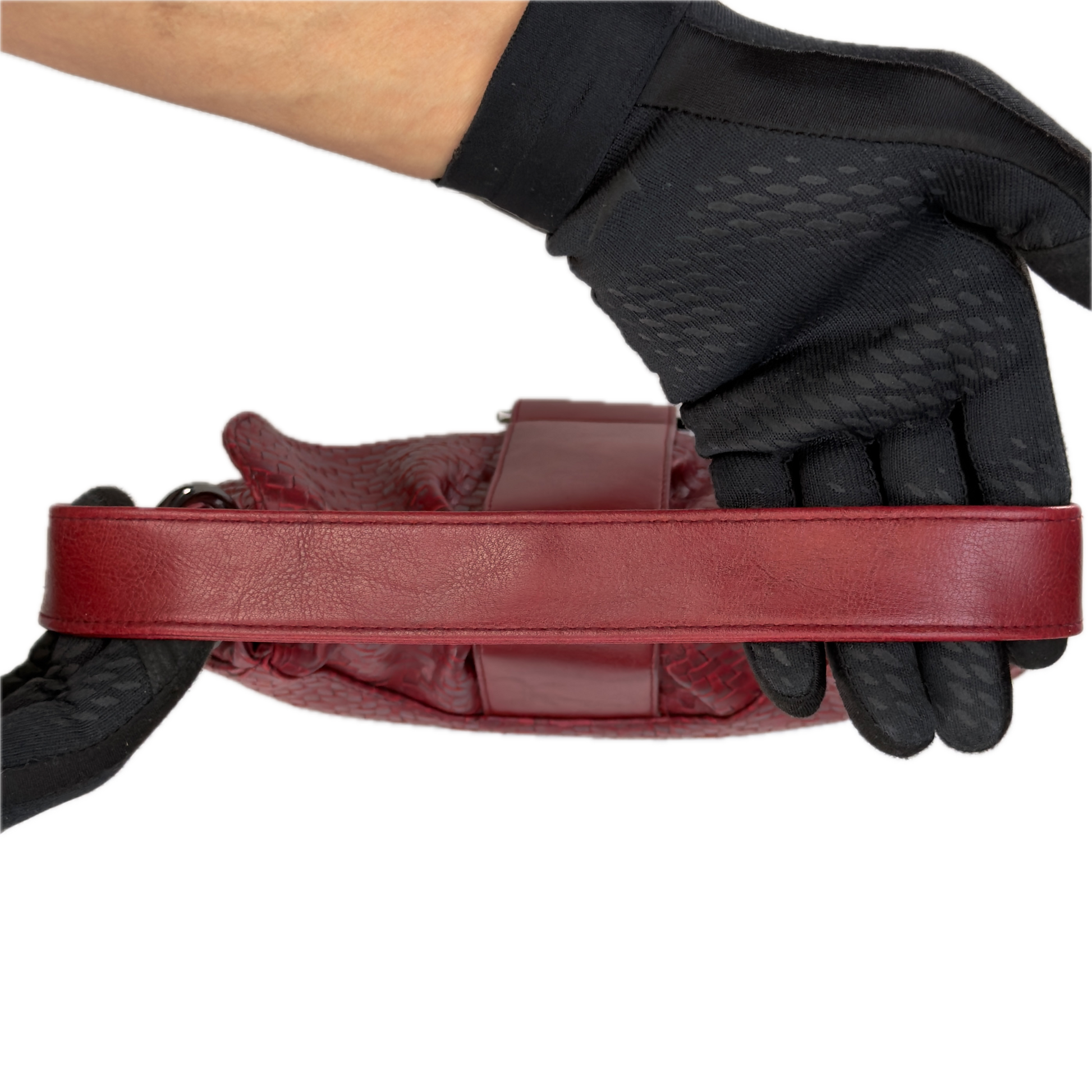Top down view of a vintage Y2K Wallis red woven faux leather baguette shoulder bag featuring gunmetal hardware and a smooth center flap.