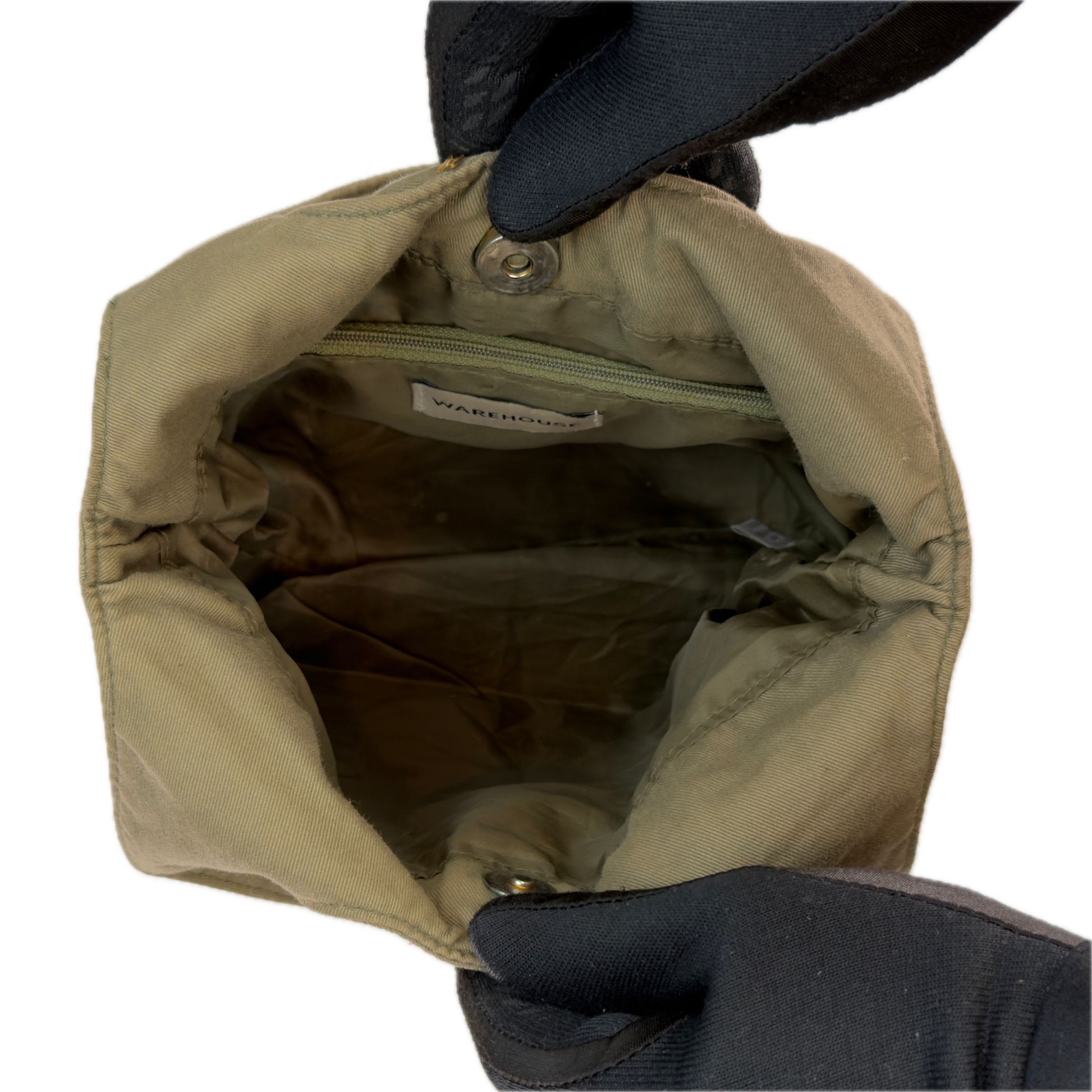 Top-down interior view of an open vintage khaki sequin bucket bag.